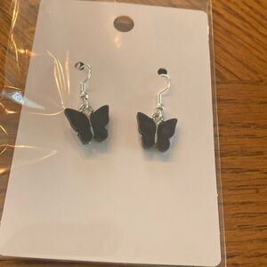 “Black Butterfly” earrings.